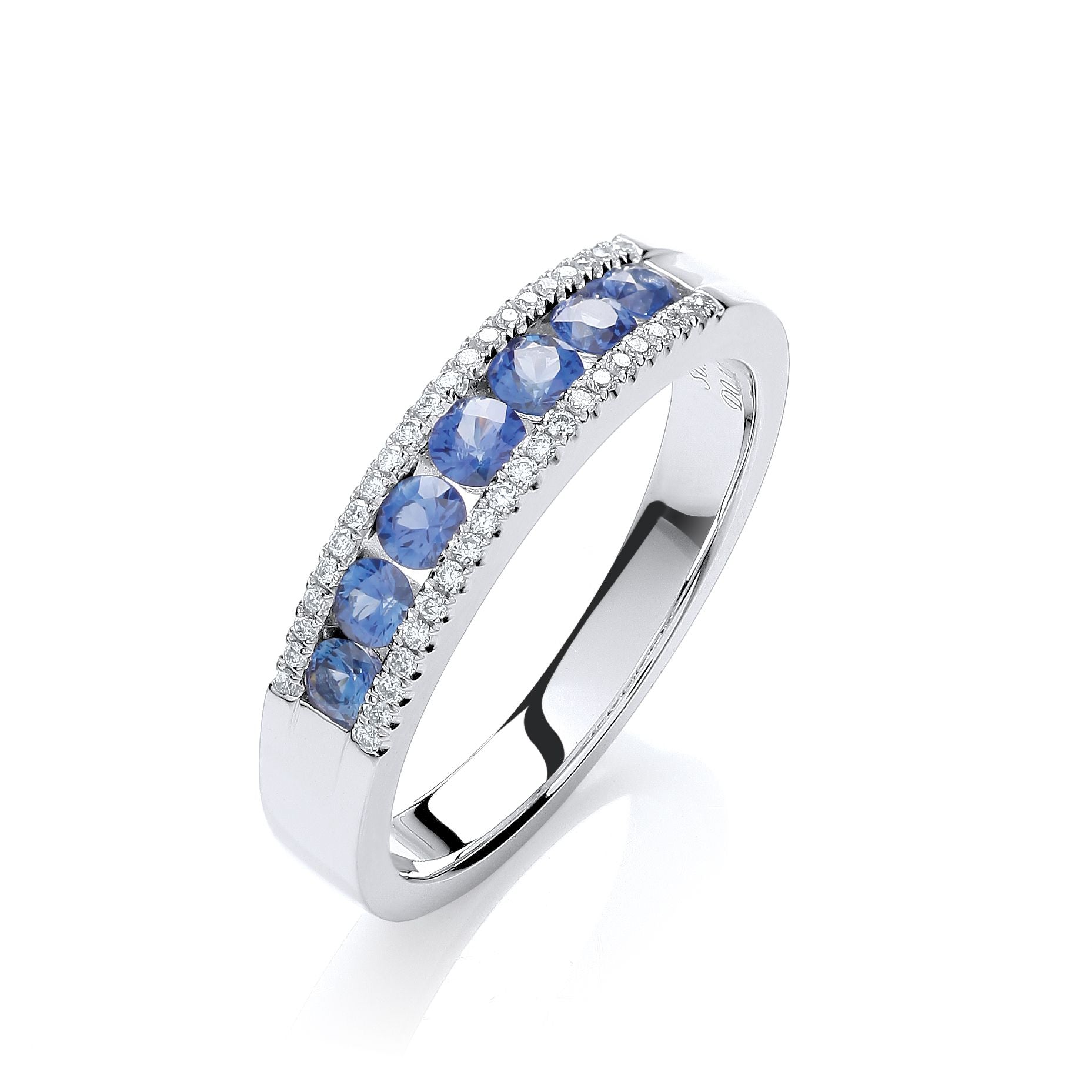 Silver ring with blue gemstones on a white background