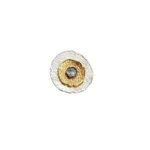 Floral pendant with gold centre and white petals on a white background