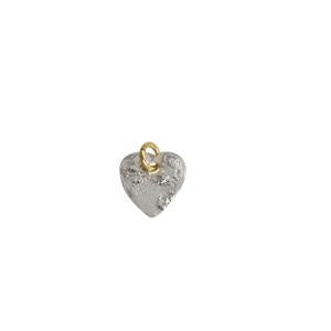 Heart-shaped pendant with gold and silver finish on a white background