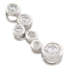 Silver earring with clear gemstones on a white background