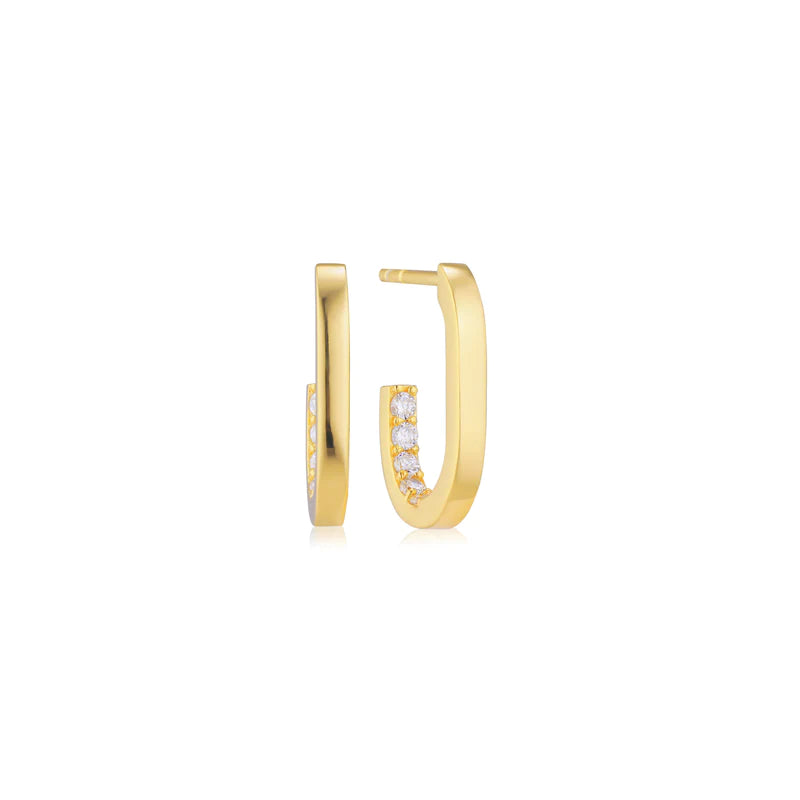 Gold hoop earrings with small diamonds on a white background