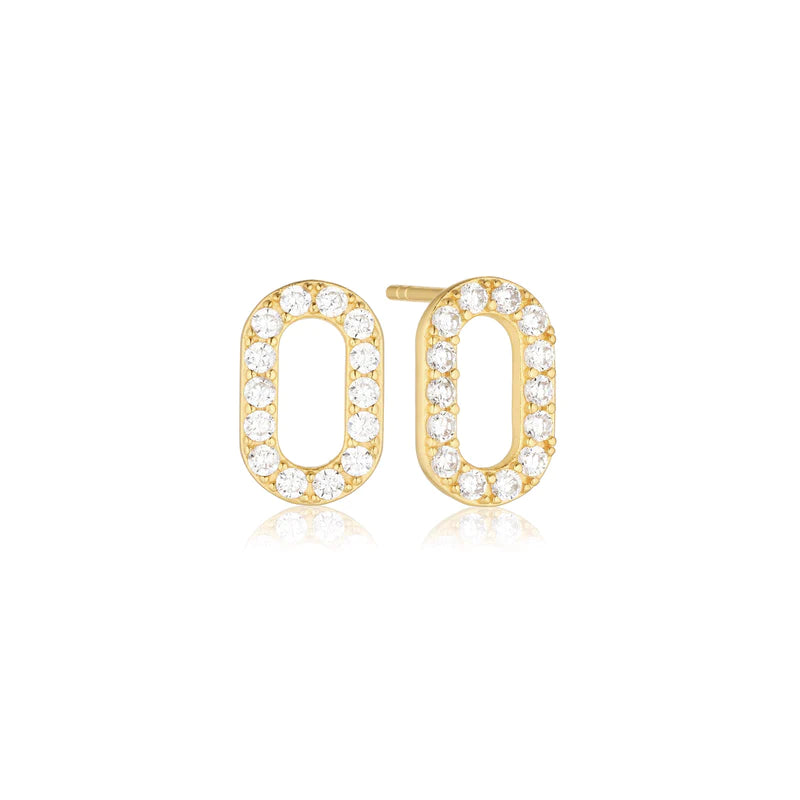 Gold hoop earrings with clear gemstones on a white background