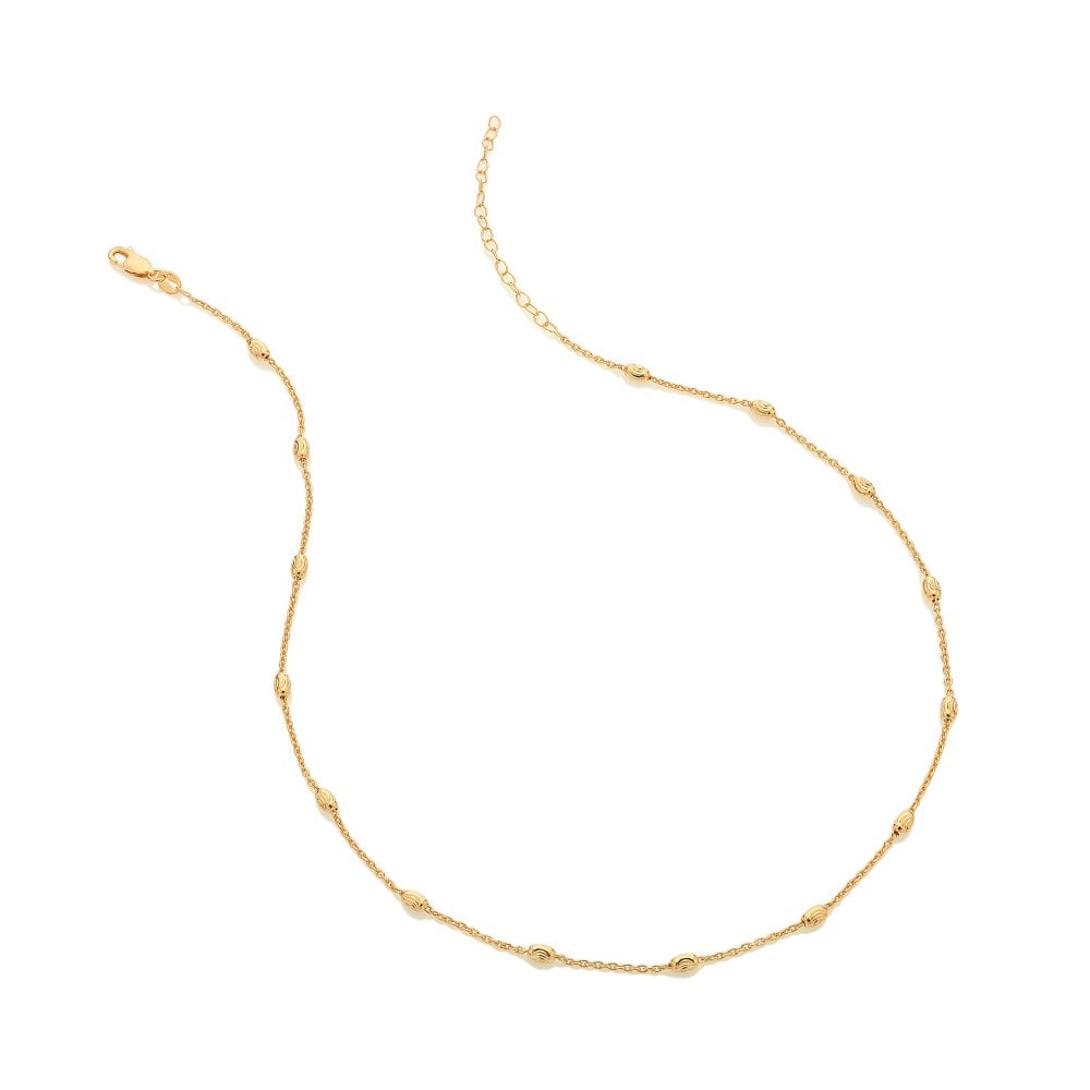 Gold necklace on a white background
