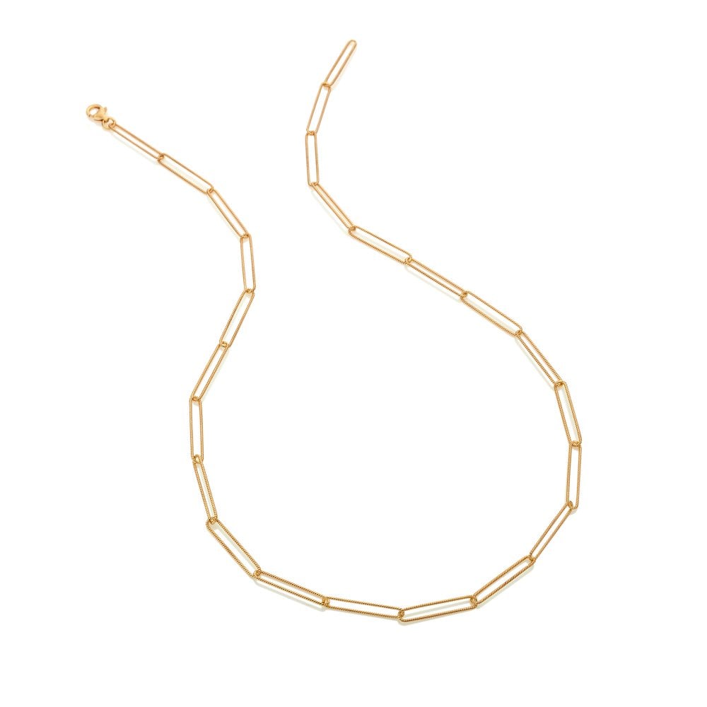 Gold chain necklace on a white background