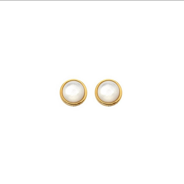 Pair of gold earrings with white pearls on a white background