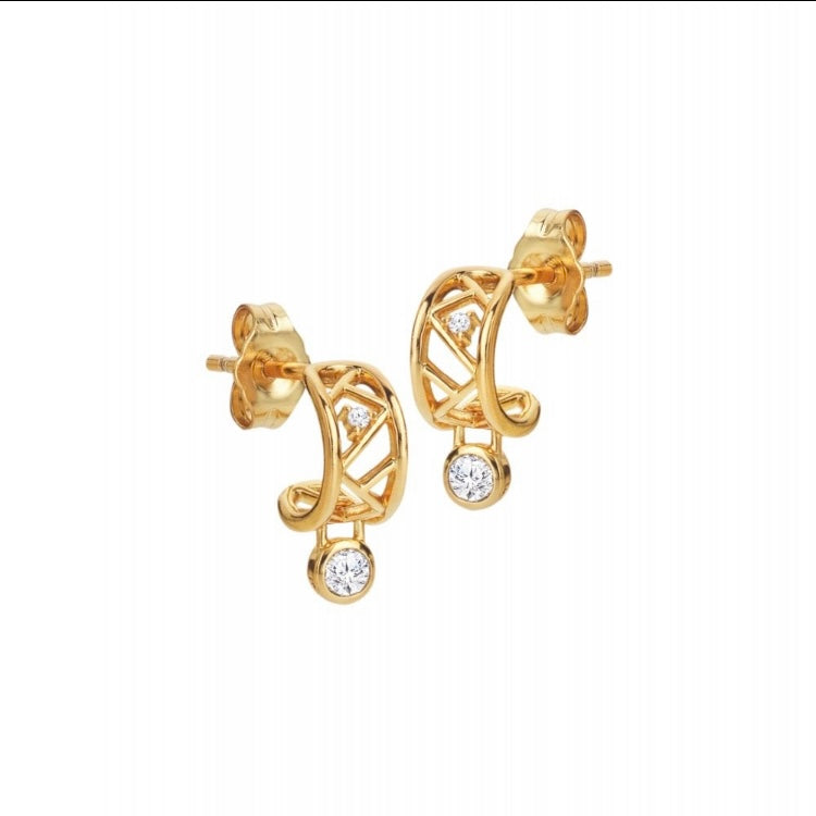 Gold earrings with diamond accents on a white background