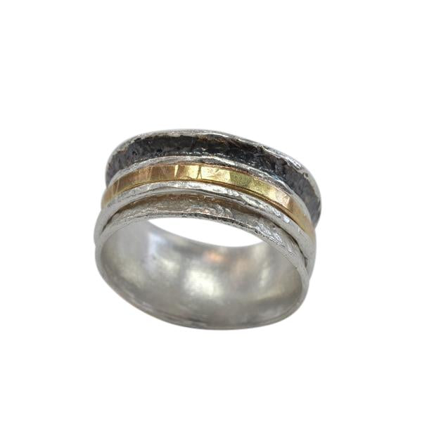 Silver ring with gold accent on a white background