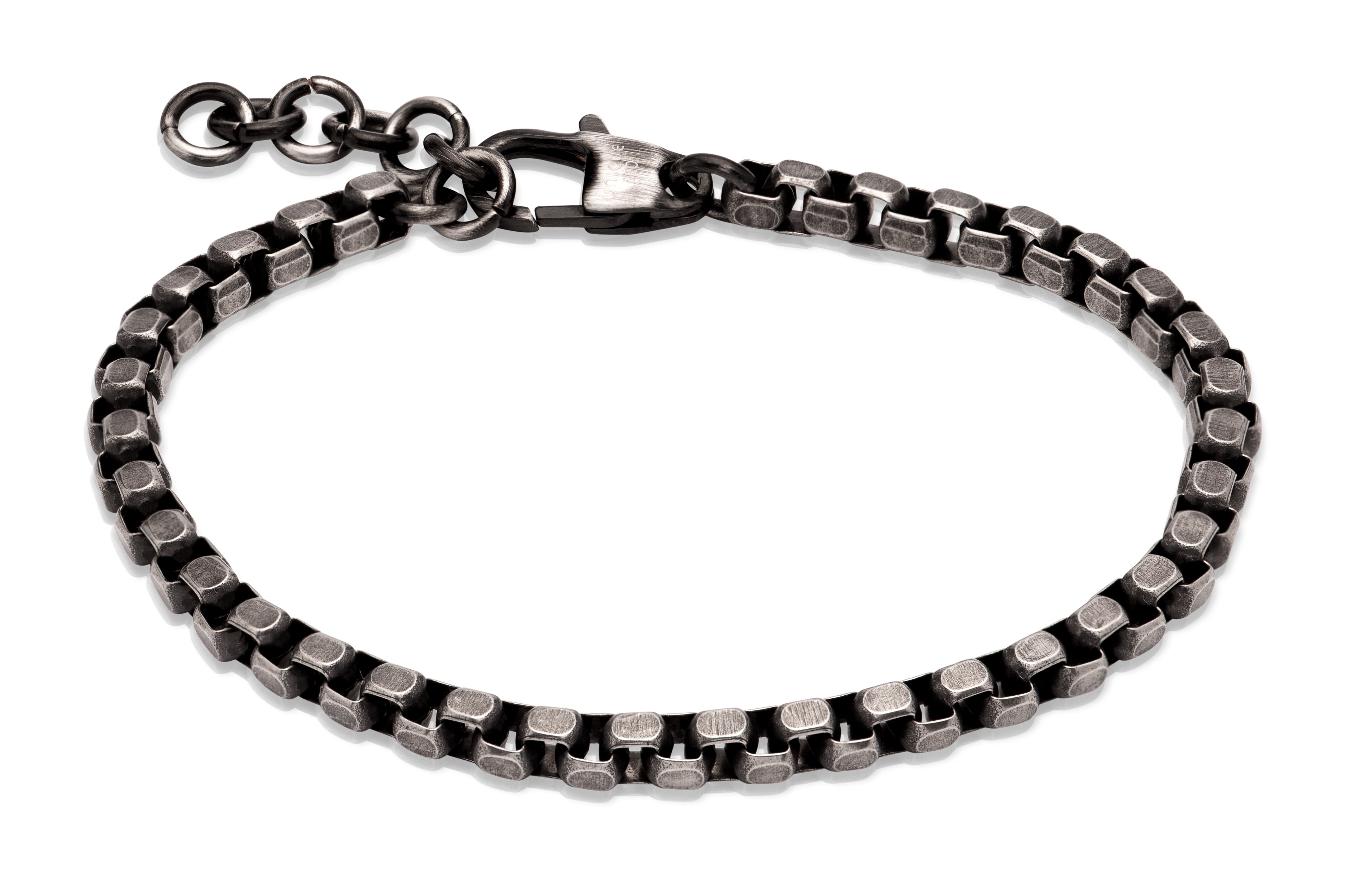 Silver chain bracelet on a white background